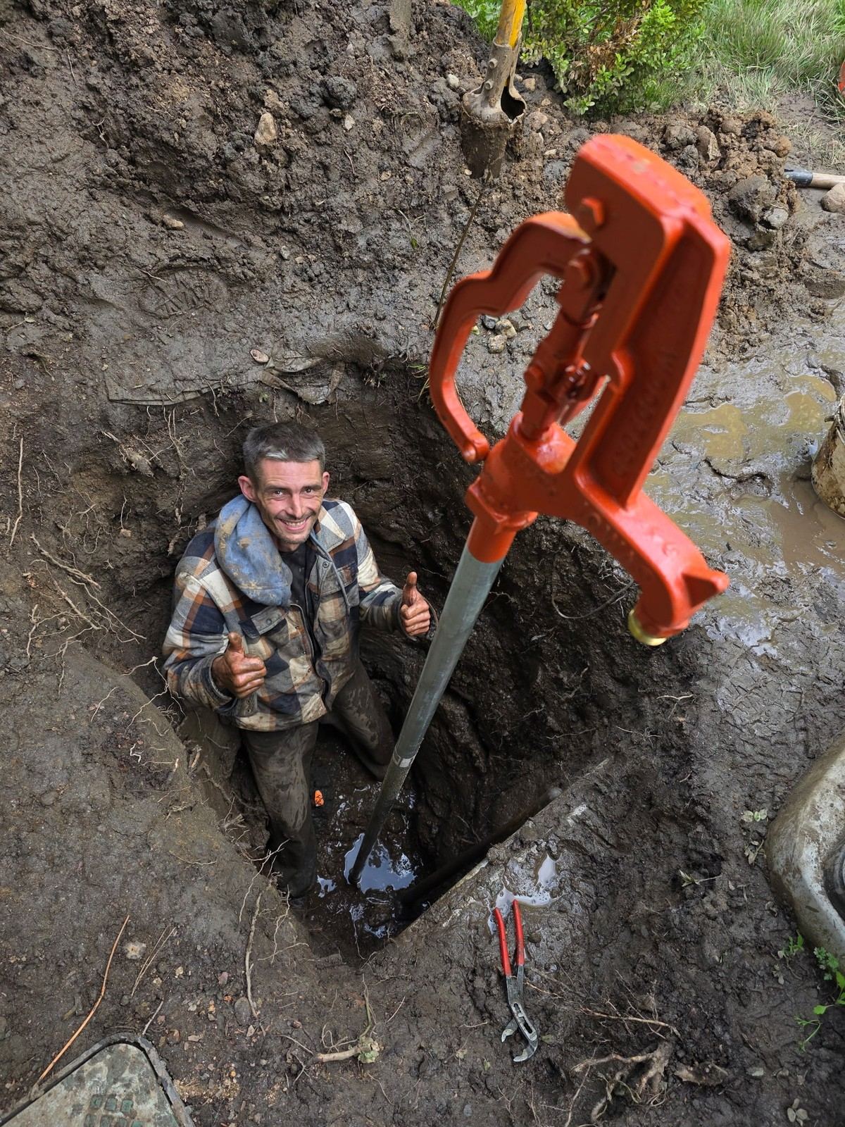 Rusty working in a trench on a Denver metro irrigation repair job